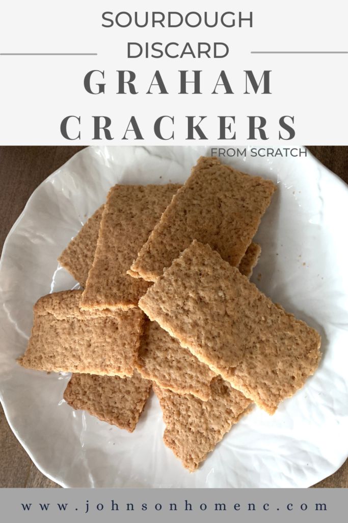 graham crackers on a white plate with text overlay that reads, sourdough disard graham crackers from scratch