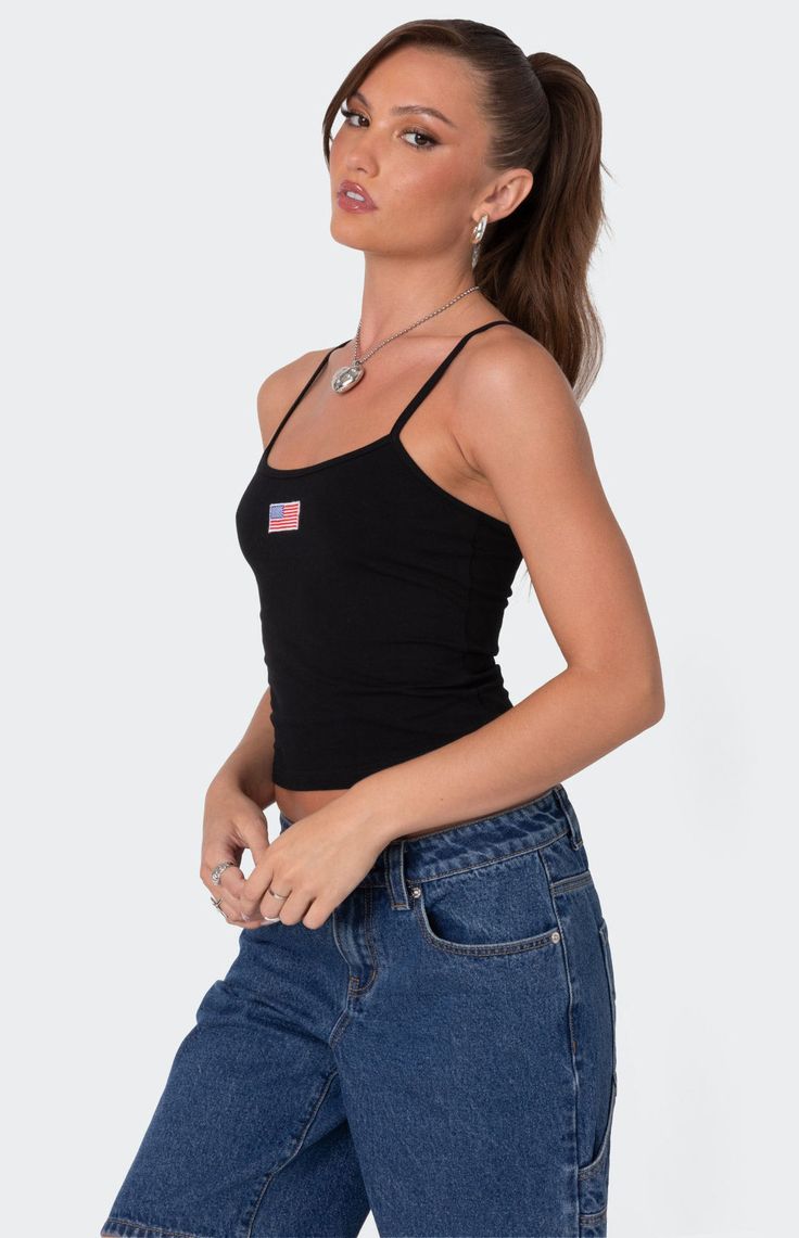 Online only! Feel like the ultimate American babe in this cute Edikted USA Tank Top. Pair this tank with any bottoms you like for the coolest effortless look. 


	Tank top
	Adjustable straps
	Embroidered patch
	Cotton, Spandex
	Model wears size S
	Model height is 5'8
	Item care: Machine wash at maximum 30C, do not bleach, tumble dry low, iron at a maximum of 110C, do not dry clean. Casual Crop Top With Tank Straps, Casual Tank Strap Crop Top For Everyday, Casual Everyday Crop Top With Tank Straps, Casual Tank Straps Crop Top For Everyday, Casual Fitted Top With Adjustable Straps, Casual Crop Tank Top With Built-in Bra, Trendy Tops With Adjustable Straps For Everyday, Casual Spaghetti Strap Tank Top, Trendy Racerback Camisole For Summer