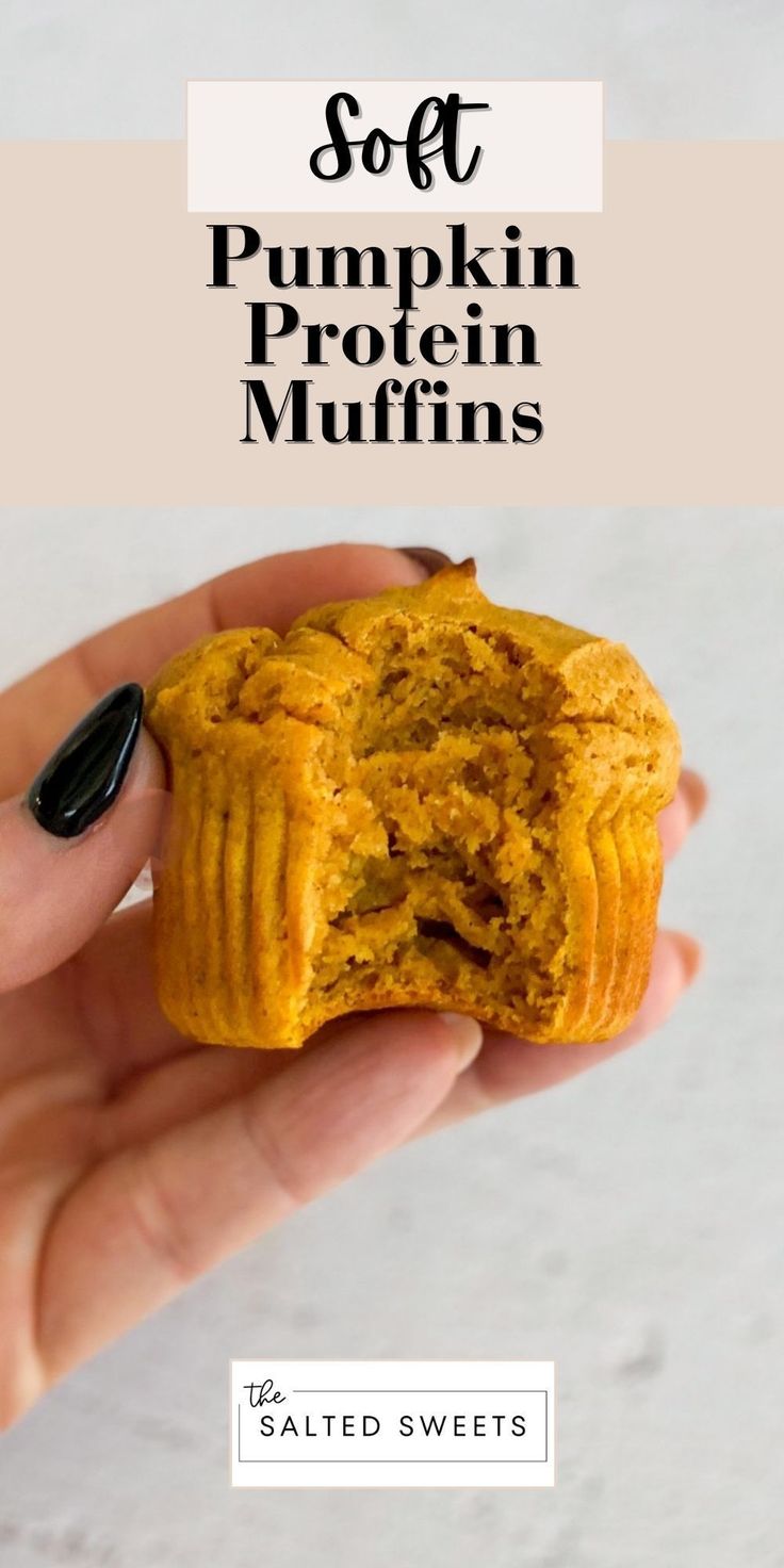 a hand holding a pumpkin protein muffin in it's palm with text overlay that reads soft pumpkin protein muffins