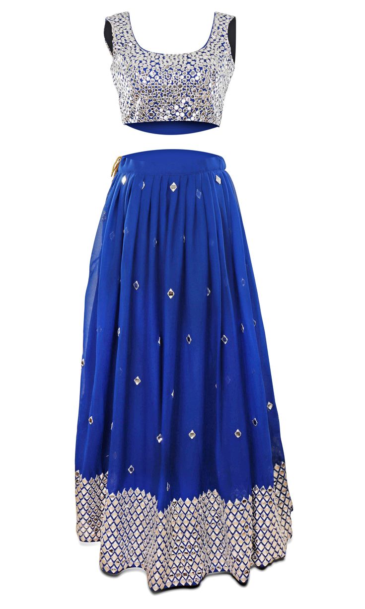 All eyes on YOU! This stunning deep blue lehenga is covered in stunning mirror work. The skirt is is paired with a matching blouse and net dupatta. The more light reflected on you, the brighter you'll shine! Anarkali Skirt With Mirror Work For Reception, Traditional Blue Sequin Choli, Traditional Skirt With Mirror Work For Reception, Blue Sequined Lehenga For Festive Occasions, Festive Blue Sequined Lehenga, Wedding Skirt With Mirror Work For Navratri, Blue Sequined Lehenga For Diwali, Festive Skirt With Mirror Work For Reception, Festive Mirror Work Skirt For Reception