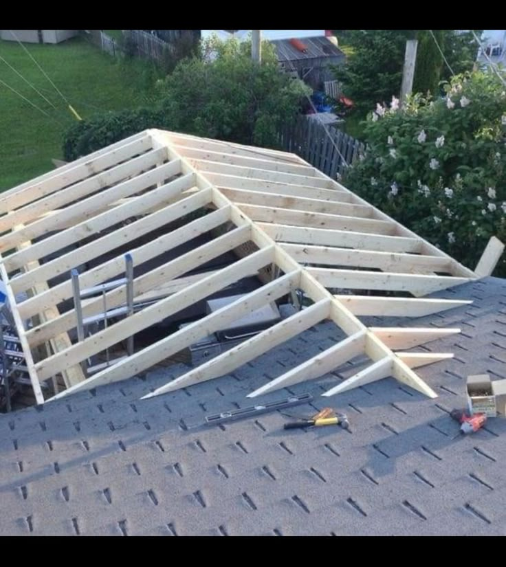 a roof that has been ripped off and is being worked on