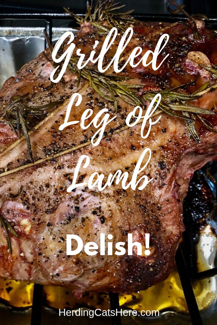 grilled leg of lamb with text overlay that reads grilled leg of lamb delish