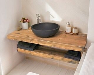 a bathroom with a sink and toilet in it