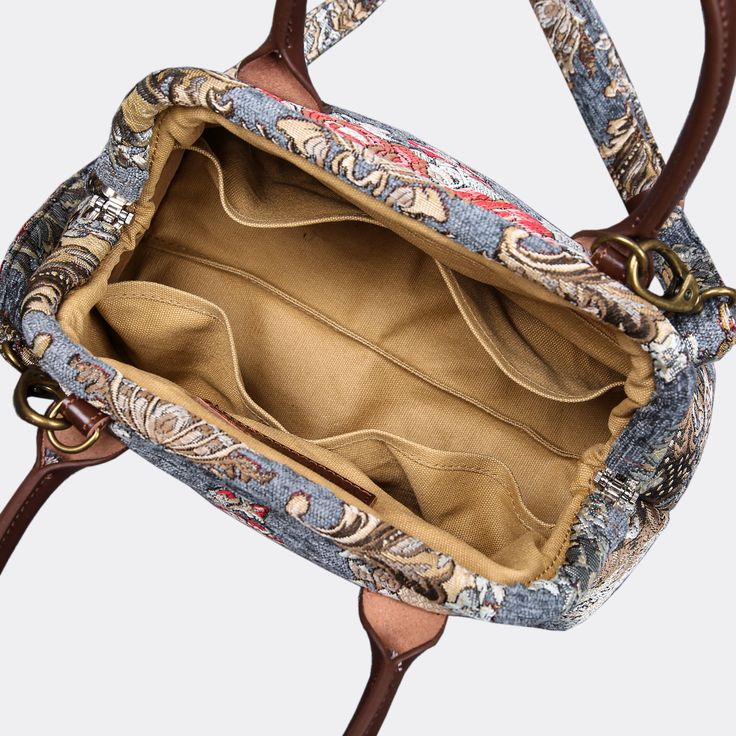 With a nod to the Victorian era, MCW’s freshly combines the classic and elegant design of the traditional carpet bag with a textural and tactile twist.The main body of the bags is made with thick chenille carpets. The handles and belts are genuine leather with heavy cotton canvas lining. Every bag comes with a detachable and adjustable shoulder strap (55 inches) made from the same chenille as the bag and fixed with high-quality bronze hookers on the two ends.The carpet hand bag size is perfect f Vintage Tapestry Shoulder Bag With Leather Handles, Tapestry Tote Satchel For Everyday Use, Everyday Tapestry Tote Satchel, Tapestry Tote Shoulder Bag With Detachable Strap, Tapestry Satchel Shoulder Bag For Daily Use, Tapestry Shoulder Bag With Top Carry Handle For Everyday, Everyday Tapestry Shoulder Bag With Top Carry Handle, Vintage Tapestry Satchel With Top Handle, Vintage Tapestry Satchel With Top Carry Handle