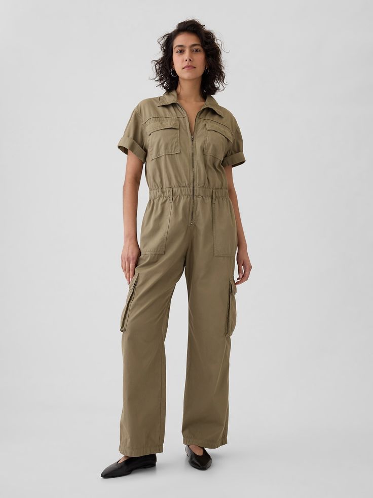 Soft cotton khaki utility jumpsuit.  Point collar, zipper front.  Short rolled sleeves.  Patch pockets at front.  Elasticized waist.  Front slant pockets, back patch pockets.  Side cargo pockets.  Responsibly Made: This khaki jumpsuit is part of our water-saving Washwell program.  Compared with conventional wash methods, Washwell uses at least 20% less water and has saved over a billion liters of water since 2016.  * Fit: Classic.  An easy silhouette throughout.  Models wearing Gap Khaki Jumpsuit, Beige Jumpsuit, Shirt Jumpsuit, Utility Jumpsuit, Boiler Suit, Safari Style, Suit Fabric, Work Wear Women, Tall Women