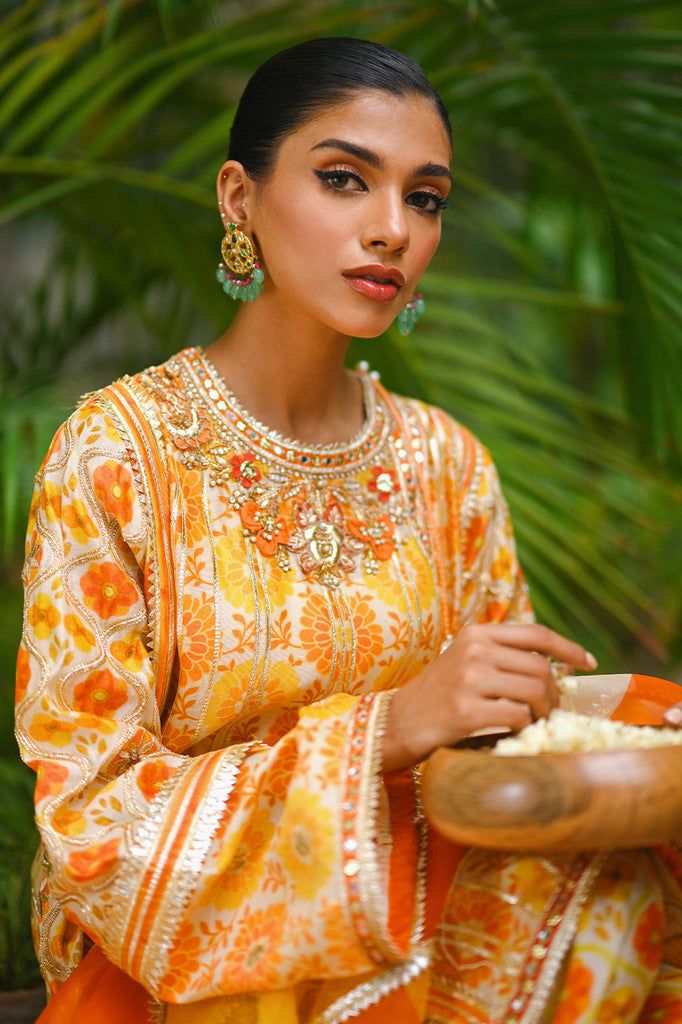 Asna – Sania Maskatiya International Semi-stitched Orange Palazzo Set With Gota Work, Orange Bollywood Designer Palazzo Set, Traditional Orange Palazzo Set With Gota Work, Orange Resham Embroidered Palazzo Set For Festivals, Orange Chanderi Palazzo Set With Gota Work, Bollywood Style Orange Palazzo Set With Straight Kurta, Orange Palazzo Set With Gota Work For Navratri, Orange Anarkali Palazzo Set With Gota Work, Navratri Orange Palazzo Set With Gota Work