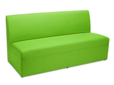 a lime green couch sitting on top of a white floor