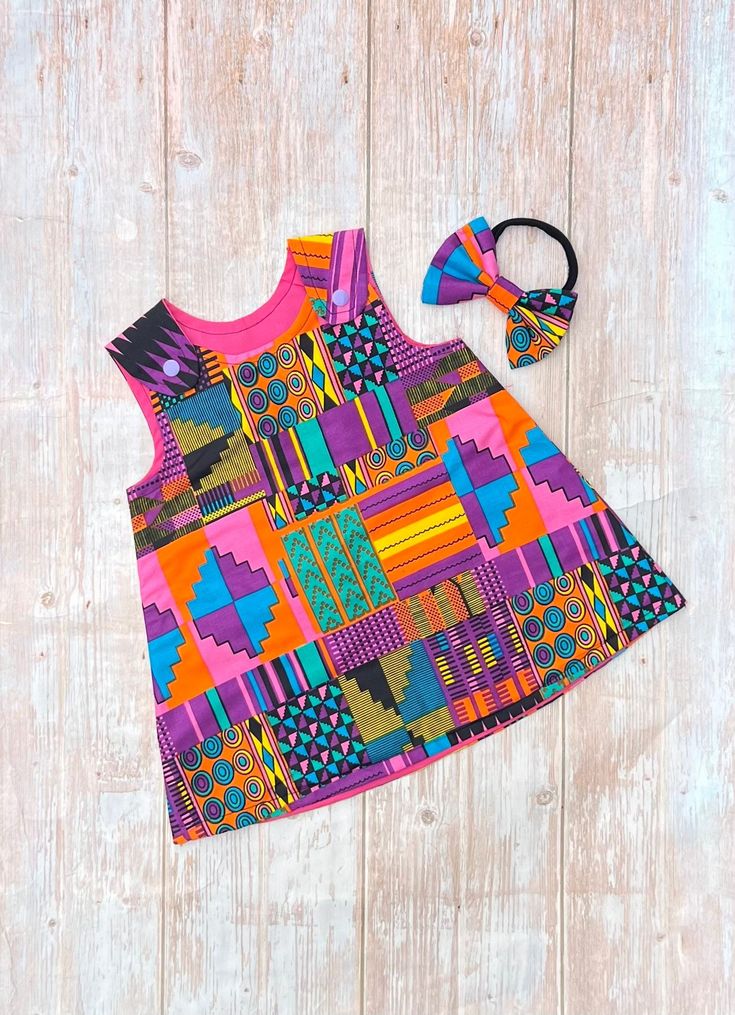 African print girl Dress. Ankara Girl dress, perfect for spring and summer. Available from size 0-3 months to 8Y The Dress is very cute and perfect for your children for special occasions. Can be custom made in many print.  Please contact me if you have any question. Care instructions: Wash on cold with similar colors (or hand wash), and hang to dry. Do not tumble dry More colors and designs will be added soon Ankara Baby Dress, Purple Kente, Dress African Print, African Babies, Kente Dress, African Print Dress Ankara, Dress Ankara, Dress African, Ankara Dress