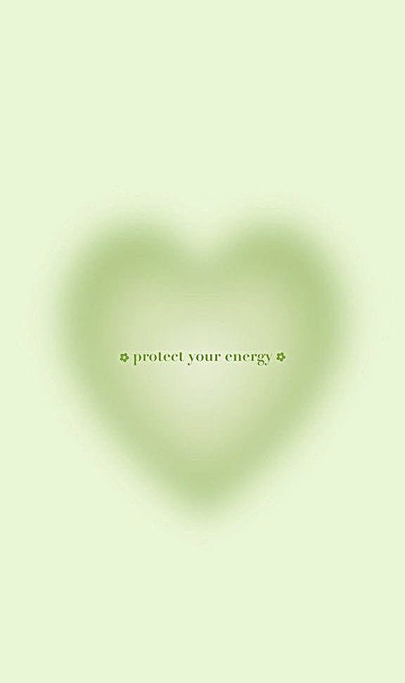 a heart shaped object with the words protect your energy written on it in green and white