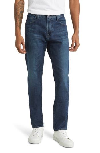 Bleach-baked jeans bring casual cool to denim days with a slim, yet comfortable fit. 14" leg opening; 10 1/4" front rise; 15" back rise Zip fly with button closure Five-pocket style 97% cotton, 3% polyester or 97% cotton, 3% polyurethane Machine wash, tumble dry Imported Casual Straight Fit Jeans With Standard Cut Leg, Fitted Straight Jeans In Dark Wash, Fitted Straight Dark Wash Jeans, Dark Wash Denim Bottoms For Casual Gatherings, Dark Wash Slim Straight Fit Jeans, Dark Wash Tapered Jeans With Straight Hem, Slim Fit Jeans For Fall With Standard Cut Leg, Casual Straight Leg Bottoms In Dark Wash, Casual Selvedge Straight Fit Jeans