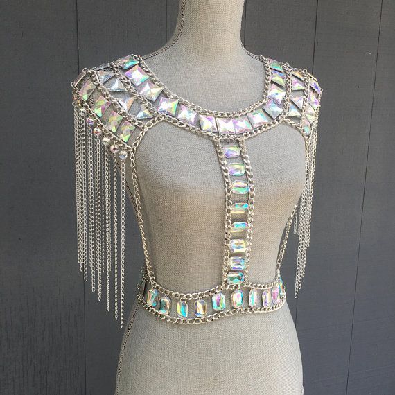 856fc81623da2150ba2210ba1b51d241desc38508850ri Chain Crop Top, Ancient Kemet, Rave Outfits Edc, Cosplay Wings, Dance Bras, Burning Men, Festival Crop Tops, Silver Skirt, Rave Bra