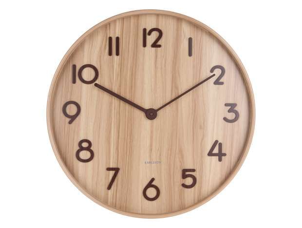 a wooden clock with black numbers on the front and back of it's face