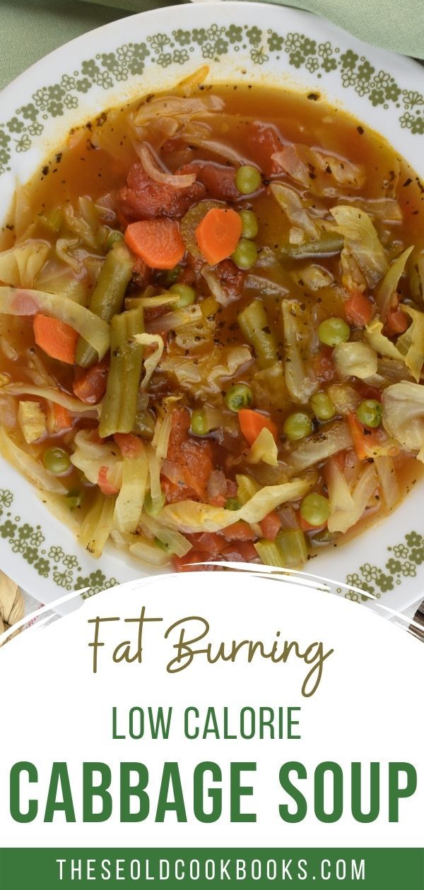 a white plate topped with cabbage soup and carrots