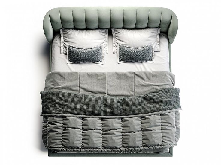 an overhead view of a bed with two pillows and one pillow on the top of it