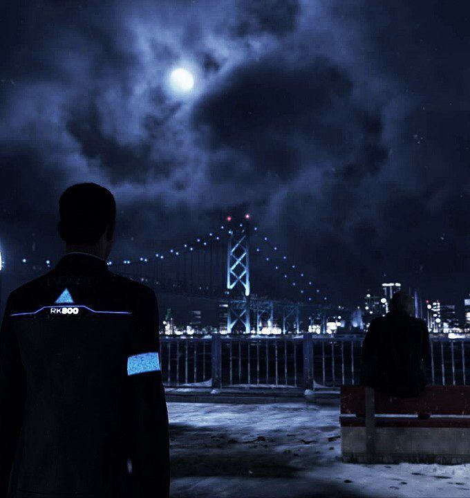 a man standing in front of a bridge at night with the moon shining behind him