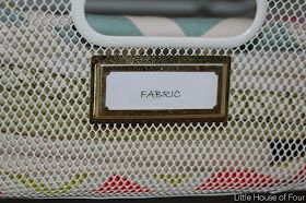 a close up of a purse with a label on it