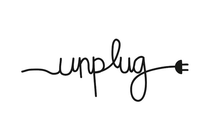 the word upplug written in cursive writing