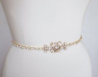 Bridal Rose gold skinny belt Skinny bridal belt sash | Etsy Elegant Evening Belts With Rhinestones, Elegant Adjustable Belt With Rhinestones, Gold Fitted Belt For Formal Occasions, Formal Fitted Gold Belt, Elegant Gold Bridal Accessories With Sashes, Glamorous Wedding Bridal Belt With Crystals, Formal Adjustable Bridal Belt With Sashes, Elegant Rhinestone Belts For Formal Occasions, Elegant Gold Bridal Belt For Bride