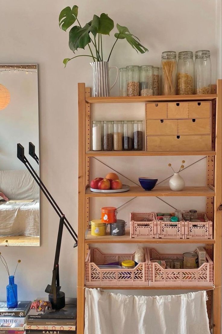 a wooden shelf filled with lots of items