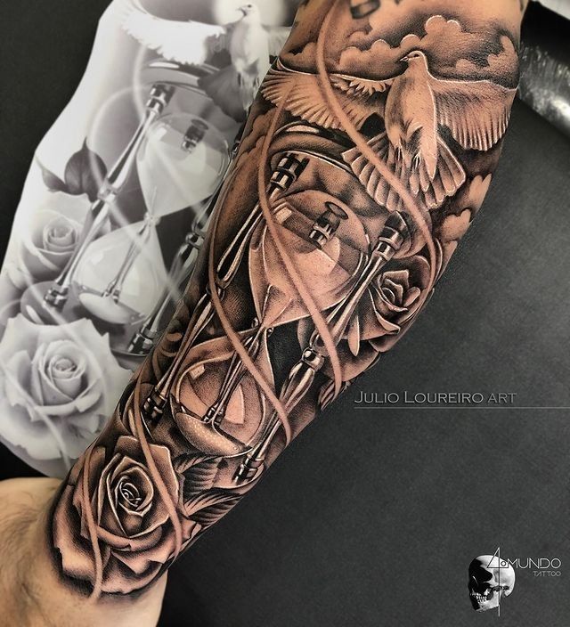 a man's arm with a clock and roses tattoo on the left side of his arm