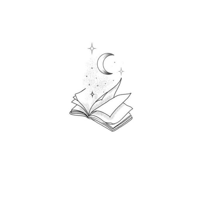 an open book with a crescent and stars above it