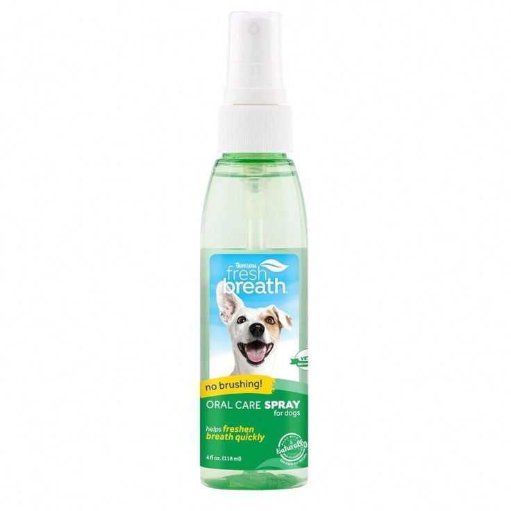 a bottle of air freshener with a dog on the front and back of it