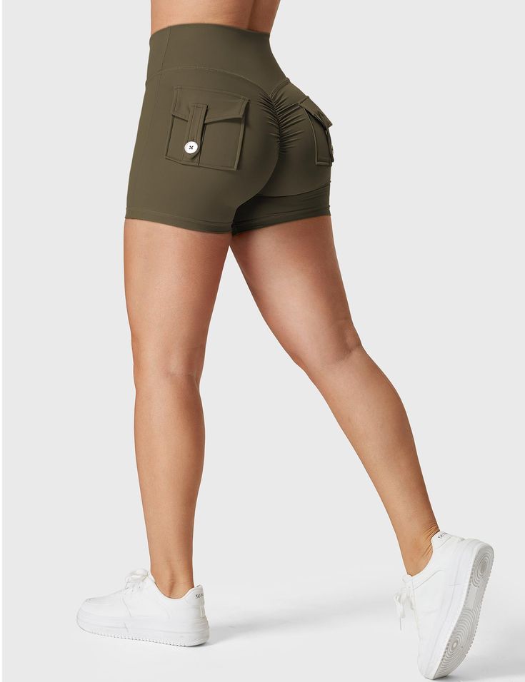 Crafted from a stretchy, breathable fabric, our V-waistband Charm Shorts offer a second-skin feel that you'll love. The stylish crossover V-front waistband not only adds flair but also perfectly accentuates your curves. With a seamless front for a polished look and hips scrunch designed to lift and enhance your shape, these shorts are both flattering and functional. Two back pockets make it easy to carry essentials. The high-waisted, anti-squat design provides abdominal control, giving you the confidence to tackle any workout. Made from compression material for support and flexibility, these shorts feature sweat-wicking technology to keep you dry. Upgrade your wardrobe with our v-waistband shorts and enjoy the ultimate blend of comfort, style, and functionality.    Feature：   Dual back poc Sporty High-waisted Shorts With Contoured Waistband, Sporty High Waist Shorts With Contoured Waistband, Functional High-waisted Shorts With Elastic Waistband, Casual 4-way Stretch Shorts With Contoured Waistband, Athleisure High-waisted Shorts With Side Pockets, Functional Bottoms With Contoured Waistband, Functional High-waisted Shorts For Workout, Compressive Yoga Shorts With Pockets, Sporty Compression Shorts With Pockets