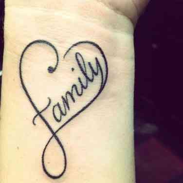 a heart with the word family written on it