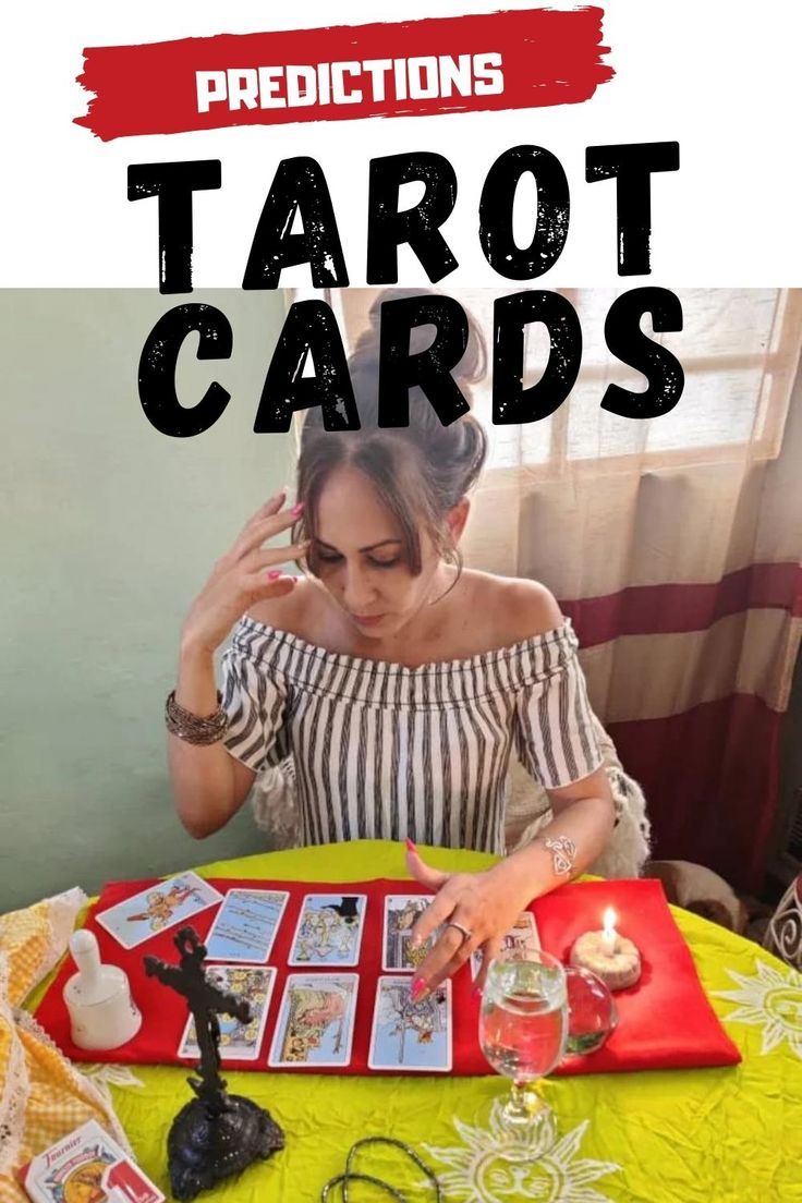 a woman sitting at a table with tarot cards in front of her and the words,