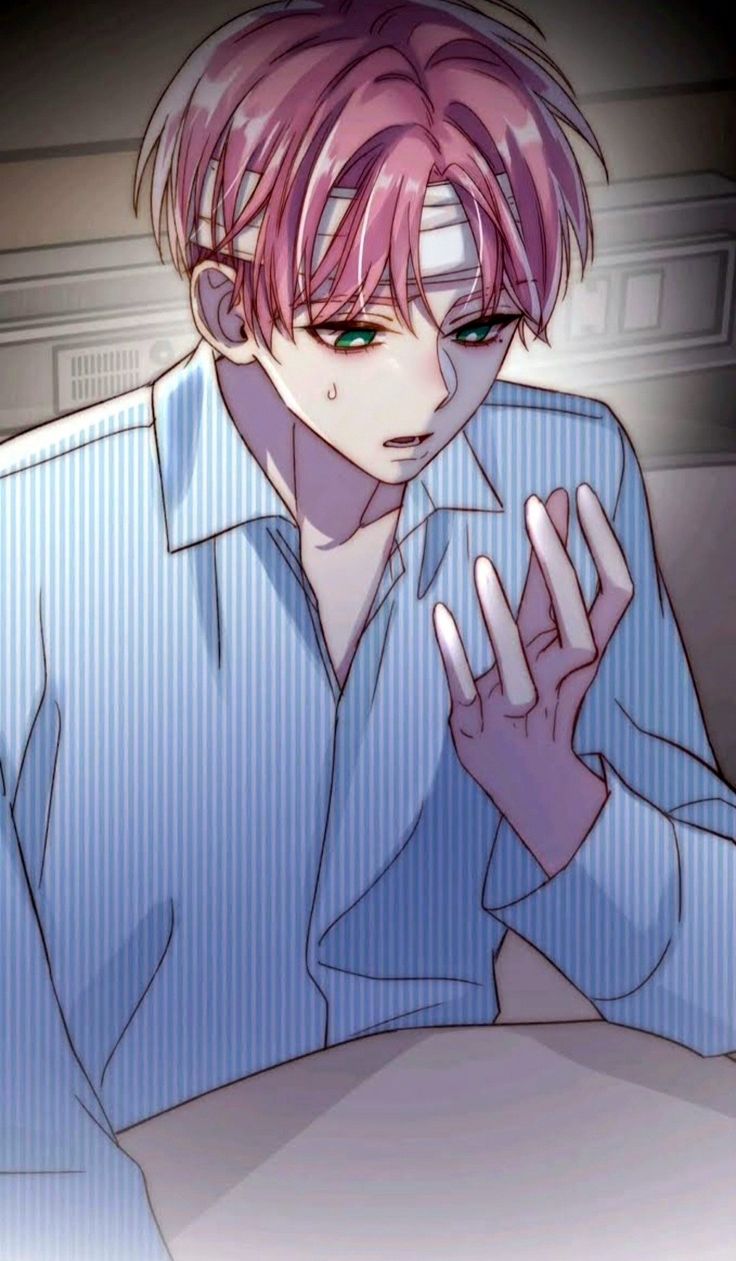 an anime character with pink hair sitting at a table and holding his hands up in front of him