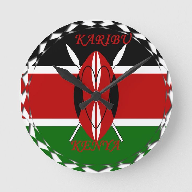 a clock with the flag of kenya and two crossed swords on it's face