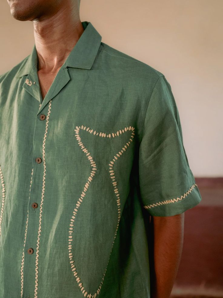 The Green Twin Fish linen shirt features a hand-embroidered katha pattern of two fish with border details on the sleeves. Made from 100% European linen, this shirt boasts an intricate and unique design. Linen Shirt Men Casual Summer, Embroidery Shirt Men, Embroidered Linen Shirt, Men Linen Shirt, Fish Shirt, One Fish Two Fish, Men Fashion Casual Shirts, Two Fish, One Fish