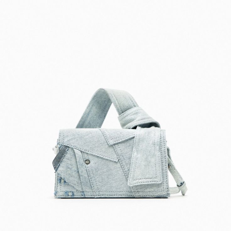 Patchwork Denim Mini City Bag Denim Mini City Bag With Patchwork Effect. Handle With Knot Detail And Long Crossbody Strap. Height X Length X Width: 4.3 X 7.5 X 2.8 Inches (11 X 19 X 7 Cm) Light Blue Denim Gray | 6025/210 Fall Season 2023 | Soldout Online Rectangular Denim Blue Shoulder Bag For Spring, Denim Blue Rectangular Shoulder Bag For Spring, Rectangular Denim Bag, Spring Denim Rectangular Shoulder Bag, Spring Denim Rectangular Bag, Spring Rectangular Denim Shoulder Bag, Spring Rectangular Denim Bag, Spring Denim Crossbody Bag, Blue Recycled Denim Bags