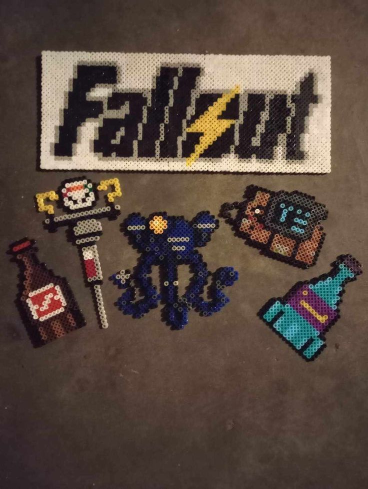 some pixelated items are laying on the floor next to each other, including a sign that says falsut