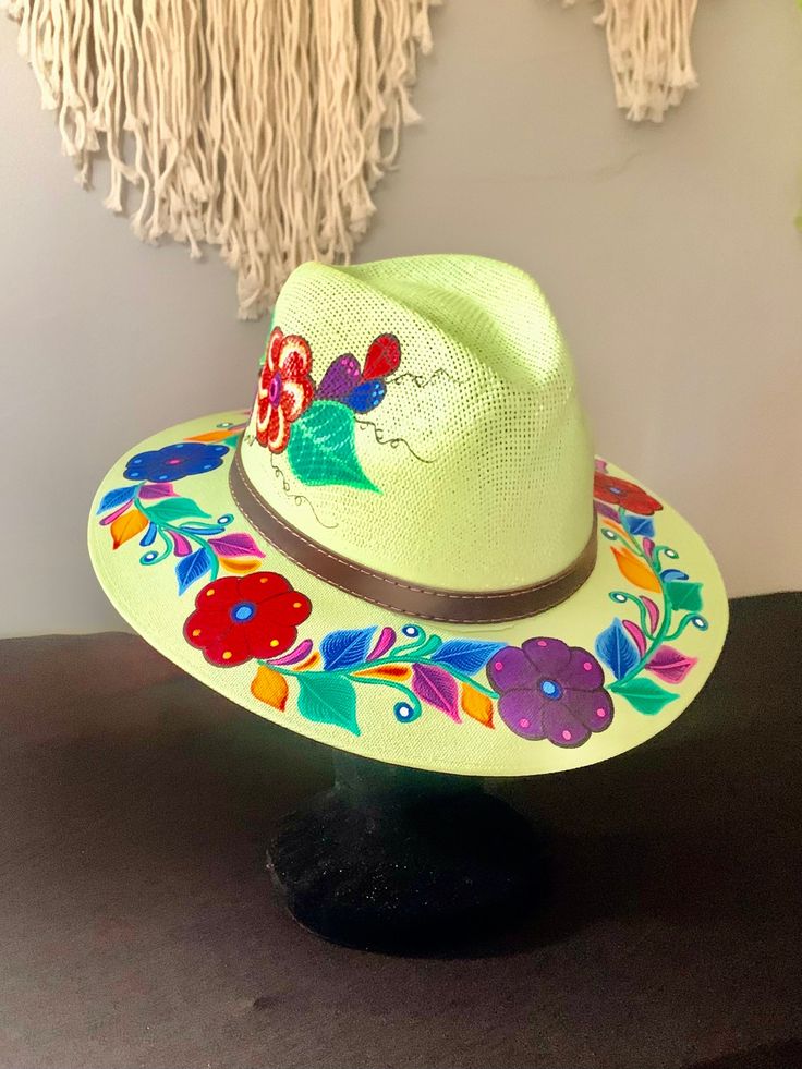 Trendy sun hats, made and handpainted in Mexico with exquisite attention to detail. Size Medium.  Brighten your day and stand out from the crowd! Spring Festival Sun Hat Hand Painted, Spring Festival Hand Painted Sun Hat, Hand Painted Curved Brim Sun Hat For Festivals, Multicolor Wide Brim Hand Painted Sun Hat, Hand Painted Sun Hat With Curved Brim For Spring, Hand Painted Curved Brim Sun Hat For Spring, Artsy Hand Painted Fedora With Curved Brim, Artisan Handmade Sun Hat For Spring, Handmade Artisan Sun Hat For Spring