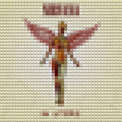 a cross made out of legos with the words jesus on it's side