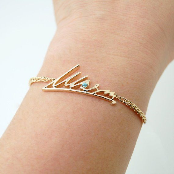 A beautiful 14k gold handwriting bracelet with your loved ones precious words will be with you for a very long time.To start the process of making your signature bracelet take a picture or scan the handwriting that you would like to make in a bracelet and send it to me as an attachment to the Etsy message. I will get back to you shortly with a sketch.This bracelet can be made in white, rose or yellow gold for no additional cost with a matching bracelet chain.I normally make the center piece of t Luxury Name Bracelet As Gift, 14k Gold Personalized Signature Jewelry, Elegant Personalized Name Bracelet As Gift For Mom, Elegant Personalized Bracelet As Gift For Mom, Elegant Personalized Bracelets As Gift For Mom, Elegant Personalized Bracelet For Mom, Elegant Rose Gold Bracelet As Gift For Mom, Elegant Rose Gold Bracelet Perfect As Gift For Mom, Elegant Rose Gold Bracelet For Mom