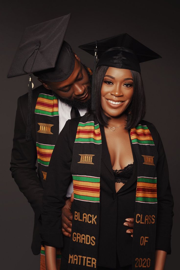 a man and woman in graduation caps and gowns