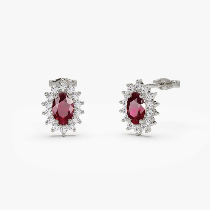 14k Oval Cut Ruby Earrings with Diamonds 14K White Gold Ferkos Fine Jewelry Red Oval Halo Design Earrings, Luxury Oval Cluster Earrings For Anniversary, Dazzling Oval Earrings For Anniversary, Elegant White Gold Oval Cluster Earrings, Classic Oval Cluster Earrings With Cubic Zirconia, Formal Oval Cluster Earrings With Prong Setting, Oval Cluster Earrings With Prong Setting For Formal Occasions, Elegant Oval Cluster Earrings With Brilliant Cut, Oval Halo Design Cluster Earrings As Gift