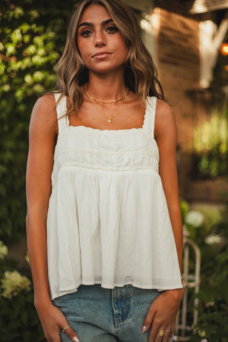 The prettiest tank you'll have in your closet! The small lace details make the top so dainty and perfect. Fits true to size. Model Info: Ava is 5'9 wearing size Small. Paired With: Double Waist Jeans Fabric Info: Self & Lace: 100% Cotton Lining: 100% Rayon Jeans And A Cute Top, Tank Tops Lace, Tank Top Outfits, Tank Top Blouse, Jeans Fabric, Flowy Tank Tops, Waist Jeans, Lace Tank Top, Lace Tank