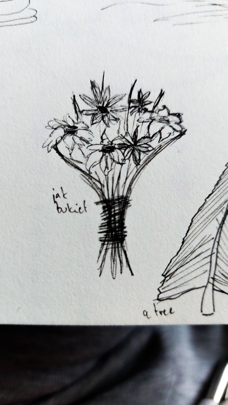 two drawings of flowers are shown in black and white, one is drawn on paper