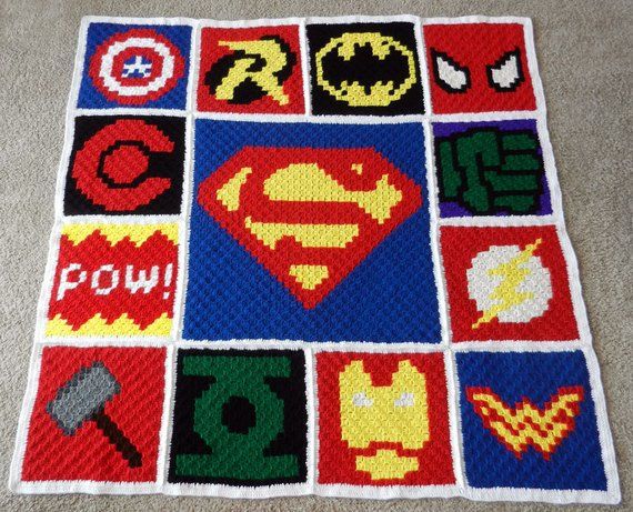 a crocheted blanket with different types of superman logos and symbols on the squares