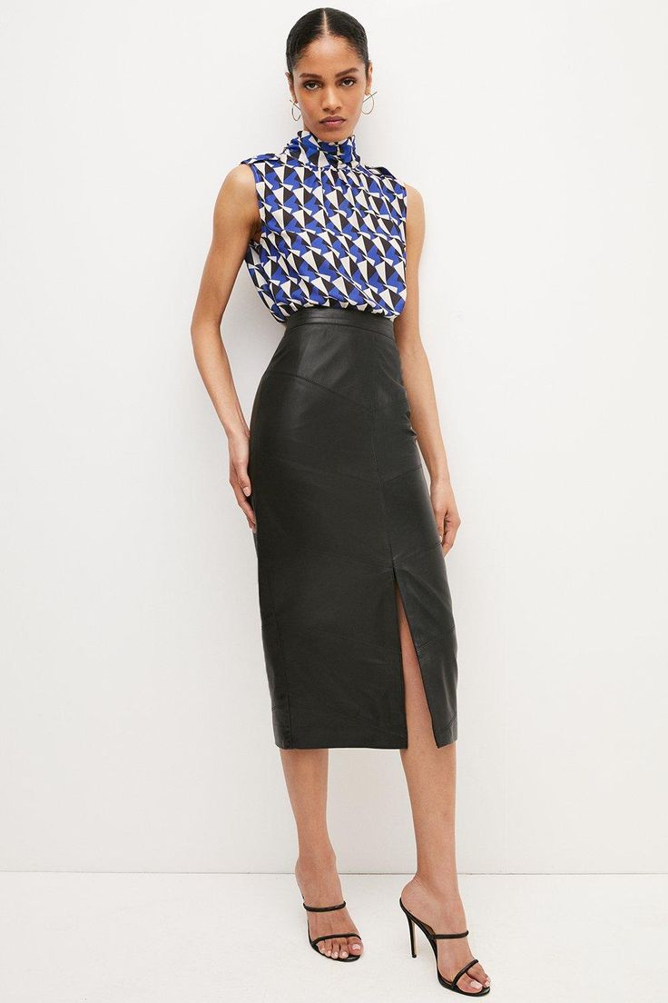 Made From Luxurious - And Responsibly Sourced - Leather, This Versatile Midi Skirt Makes A Directional Alternative To Your Favorite Denim Style. The Demure Pencil Silhouette Is Instantly Modernised By Seamed Detailing And A Central Hem Split - Just Add A Chunky Belt And Strappy Heels To Elevate The Piece For After Dark.This Garment Is Ready For The Future. It Is Made With Responsibly Sourced Leather From Tanneries Working To Reduce Their Environmental Impact. Leather Midi Skirt For Work, Fitted Leather Pencil Skirt In Modern Style, Leather Knee-length Pencil Skirt For Work, Fitted Modern Leather Pencil Skirt, Modern Fitted Leather Pencil Skirt, Leather Pencil Skirt For Work, Modern Leather Skirt For Work, Spring Leather Midi Skirt, Spring Leather Midi-length Skirt