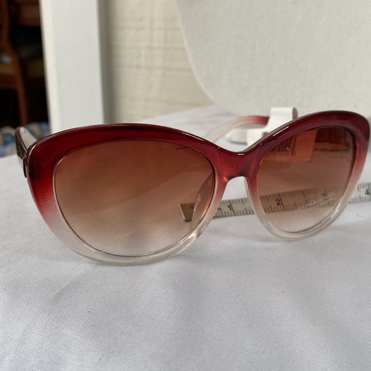 Beautiful Pair Of Ombr Style Fashion Sunglasses. These Has A Maroon Red Color Which Leads Down To A Frosty White Area. Brown Lens And Wonderful To Add To Your Beach Resort Wardrobe. See Pictures For Details Ask Any Questions Bundle For Extra Savings Happy Poshing Red Sunglasses For Spring Beach Occasions, Red Sunglasses For Beach In Spring, Red Sunglasses With Gradient Lenses For Spring, Red Sunglasses For Summer Beach, Casual Red Cat Eye Sunglasses, Red Glass Sunglasses For Summer, Red Cat Eye Sunglasses With Tinted Lenses For Beach, Red Cat Eye Sunglasses For Beach, Casual Red Cat Eye Sunglasses With Uv Protection