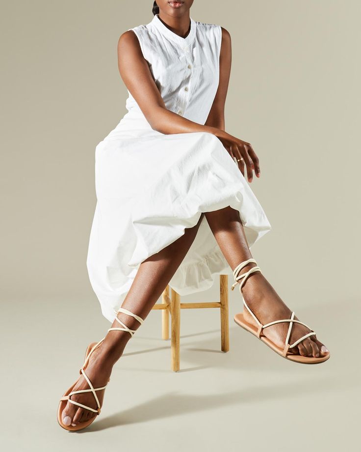 Our new lace up sandal redefines versatility with her lightweight design and natural contrasting rope. The Petra is the perfect blend of fashion and function making her an easy transition from day to night. Lace up and go! Chic Natural Sandals For Summer, Beige Strappy Lace-up Sandals For Spring, Casual Leather Lace-up Sandals For Vacation, Casual Beach Sandals With Rope Detail, Chic Lace-up Flat Heel Sandals For Beach, Chic Flat Heel Lace-up Sandals For Beach, Chic Adjustable Lace-up Open Toe Sandals, Chic Natural Sandals For Summer Outings, Natural Sandals With Braided Straps For Spring