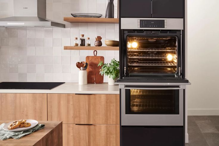 two ovens side by side in a kitchen