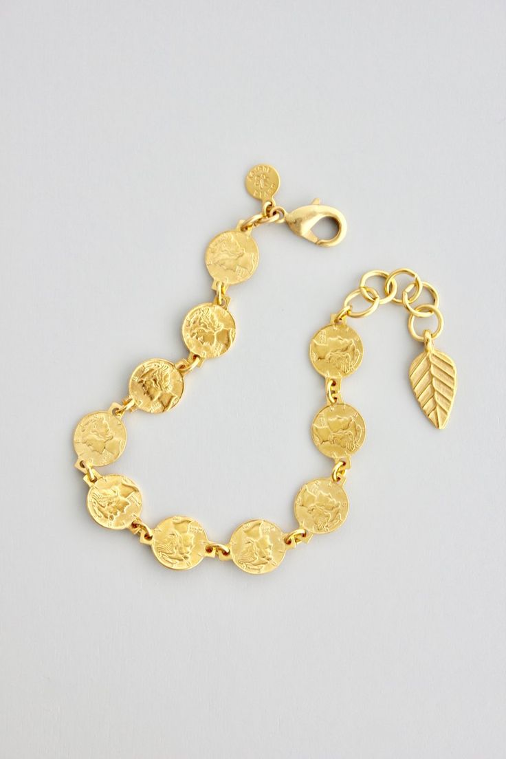 18k gold plated brass coin chain bracelet with one inch extender Gold-tone Medallion Jewelry With Adjustable Chain, Brass Coin Jewelry With Adjustable Chain, Adjustable Gold-tone Gold-plated Charm Bracelet, Adjustable Gold Plated Medallion Jewelry, Adjustable Gold-tone Charm Bracelet, Adjustable Gold-tone Gold Plated Charm Bracelet, Adjustable Plated Bracelet, Nickel-free Gold Coin Necklace, Nickel-free Gold Round Disc Coin Necklace