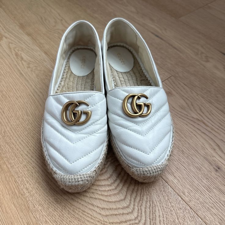 Authentic Gucci White Espadrilles. Great Condition. Shows Wear, Scuffs, Wrinkling And Stretching. Gucci White Round Toe Espadrilles, White Gucci Espadrilles For Spring, White Casual Gucci Espadrilles, Gucci Leather Beach Espadrilles, Gucci Leather Espadrilles For Beach, Designer Leather Sole Espadrilles For Spring, Designer Espadrilles With Leather Sole For Spring, Luxury Espadrilles With Woven Sole, Designer Closed Toe Espadrilles With Branded Insole