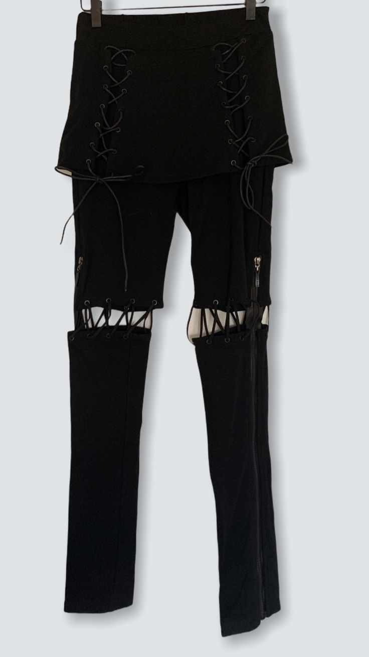 NEW Goth Lace Up Leggings Skirt Available in Small Med or Large Size XS/S - 25.5 inch waist Size Med - 27 inch waist Size Large- 28.5 inch waist Legging with skirt Lacing and zippers on legs Lacing also on skirt Perfect for goth punk alt egirl mallgoth cybergoth cyberpunk metal Stretch Grunge Bottoms For Streetwear, High Waist Rock Style Bottoms For Streetwear, Grunge High Waist Stretch Bottoms, Stretch Grunge Pants For Alternative Fashion, High Waist Stretch Grunge Bottoms, Alternative Black Stretch Bottoms, Alternative Style Black Stretch Bottoms, Alternative Style Stretch Black Bottoms, Rock Style Bottoms For Spring Streetwear