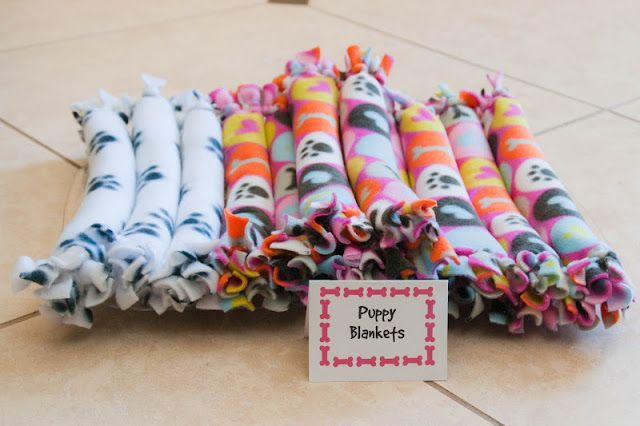 there are many different colored umbrellas on the floor with a sign that says happy birthday